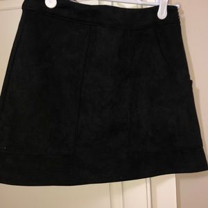 Black suede skirt came from boutique in hometown